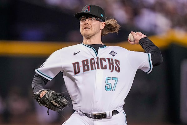 FILE - Arizona Diamondbacks relief pitcher Andrew Saalfrank throws against the Texas Rangers during the ninth inning in Game 3 of the baseball World Series Monday, Oct. 30, 2023, in Phoenix. (AP Photo/Brynn Anderson, FIle)