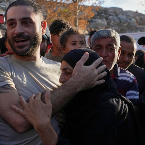 Hussein Ayash, who was released from an Israeli prison, hugs his mother as he arrives at his family home in the southern village of Harouf, Lebanon, Friday, Sept. 4, 2026. (AP Photo/Mohammed Zaatari)
