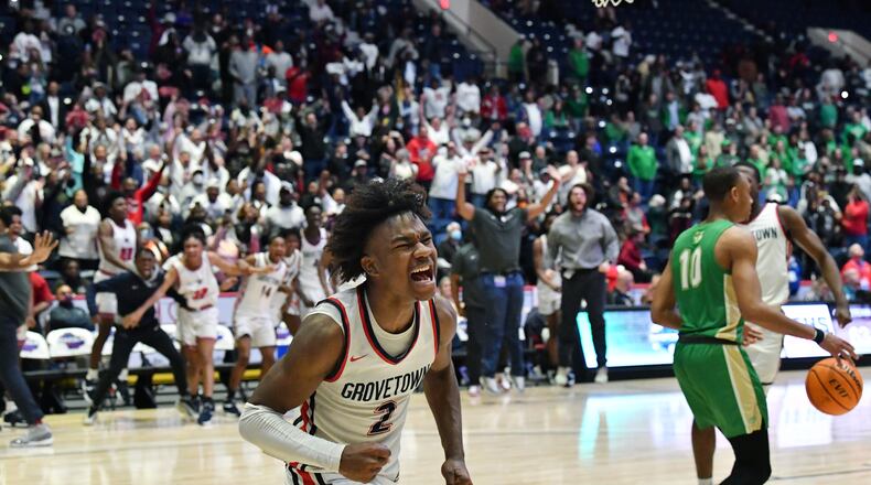 March 11, 2022 Macon - Grovetown's Frankquon Sherman (2) reacts after dunking the ball at the end of the 4th quarter during the 2022 GHSA State Basketball Class AAAAAA Boys Championship game at the Macon Centreplex in Macon on Friday, March 11, 2022. Grovetown won 66-59 over Buford. (Hyosub Shin / Hyosub.Shin@ajc.com)