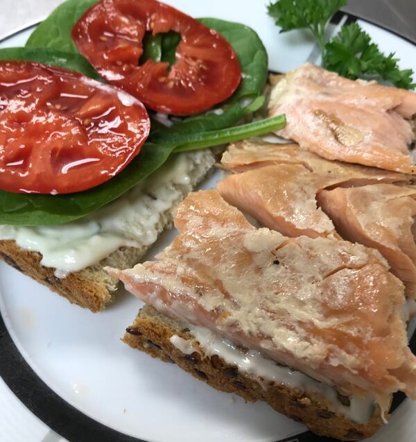 One-way customers enjoy the smoked salmon from Diana’s Specialties is in a salmon, tomato and spinach sandwich. 
Courtesy of Diana Fitzgerald