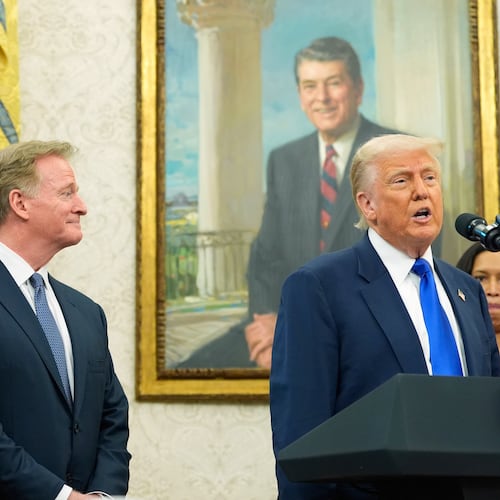 FILE - President Donald Trump speaks as Washington Commanders owner Josh Harris, from left, NFL Commissioner Roger Goodell and District of Columbia Mayor Muriel Bowser listen during an event in the Oval Office of the White House, May 5, 2025, in Washington. (AP Photo/Alex Brandon, File)