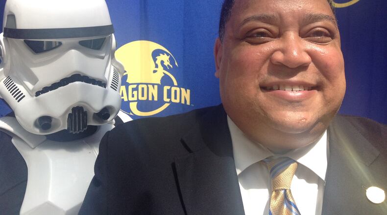 City Councilmember Michael Julian Bond is known around City Hall for his affinity for comics and science fiction. He said that he and his family are regular attendees to Dragon Con. Mayor Kasim Reed noted that next week, Bond will likely be found in the Batmobile.