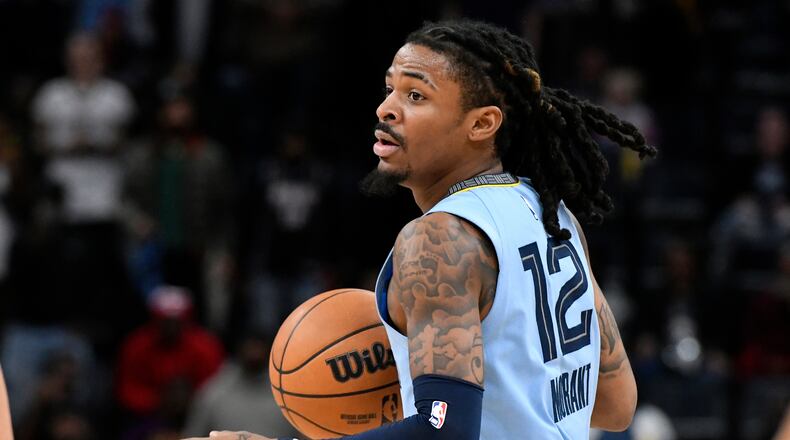 FILE - Memphis Grizzlies guard Ja Morant (12) plays in the second half of an NBA basketball game against the Atlanta Hawks Jan. 21, 2026, in Memphis, Tenn. (AP Photo/Brandon Dill, File)