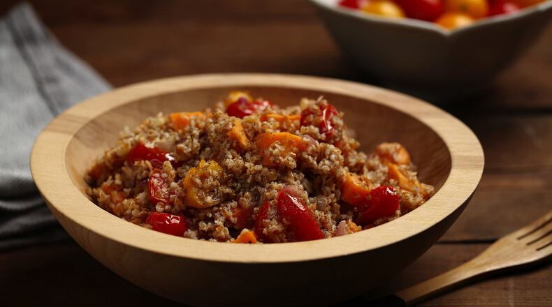 Roasted sweet potatoes, tomatoes and onion bring heft to a winter version of tabbouleh. Styled by Joan Moravek. (E. Jason Wambsgans/Chicago Tribune/TNS)