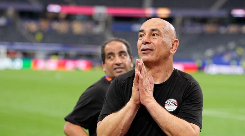 Egypt head coach Hossam Hassan reacts after winning a penalty shootout against Australia for the World Cup round of 32 soccer match in Arlington, Texas, near Dallas, Friday, July 3, 2026. (AP Photo/Tony Gutierrez)