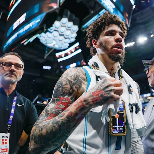 Charlotte Hornets guard LaMelo Ball walks off the court after an NBA play-in tournament basketball game against the Miami Heat in Charlotte, N.C., Tuesday, April 14, 2026. (AP Photo/Nell Redmond)