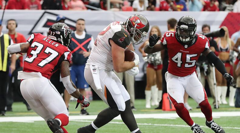 September 11, 2016 ATLANTA: Buccaneers tight end Brandon Myers catches a touchdown pass between Falcons defenders Ricardo Allena and Deion Jones during the first half in an NFL football game on Sunday, Sept. 11, 2016, in Atlanta. Curtis Compton /ccompton@ajc.com