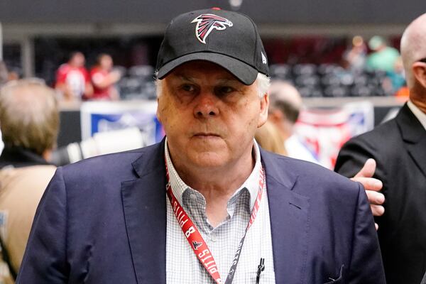 FILE - Frederick W. Smith, Chairman, President and CEO of FedEx Corporation is seen before the first half of an NFL football game between the Atlanta Falcons and the Philadelphia Eagles, Sunday, Sept. 12, 2021, in Atlanta. (AP Photo/John Bazemore, File)