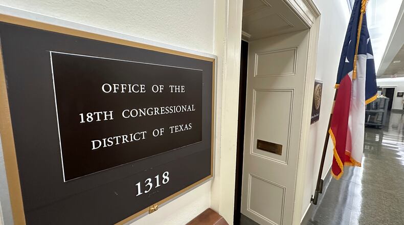 A Texas flag is on display outside the office of the state's 18th Congressional District, which has a seat that became vacant March 5, 2025, following the death of Democratic Rep. Sylvester Turner, in Washington, Sept. 2, 2025. The (AP Photo/Robert Yoon)