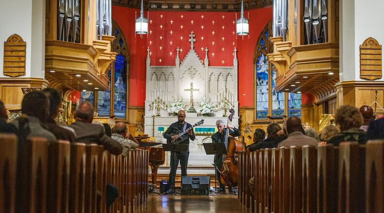 Rod Harris, Jr. (left) on guitar and Andy Eulau on bass at All Saints’ Episcopal.