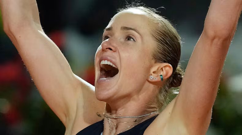 Ukraine's Elina Svitolina celebrates after winning against United States' Coco Gauff at the end of the women's final match at the Italian Open tennis tournament in Rome, Saturday, May 16, 2026. (AP Photo/Alessandra Tarantino)