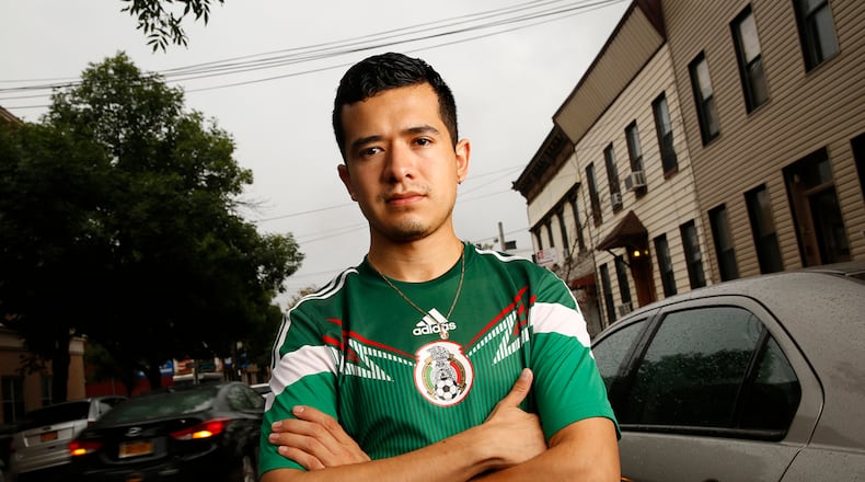 Ricardo Aca, 24, works as a busboy at a restaurant in Trump SoHo condo tower. He became a YouTube hit with his video speaking out against Trump's immigration comments.