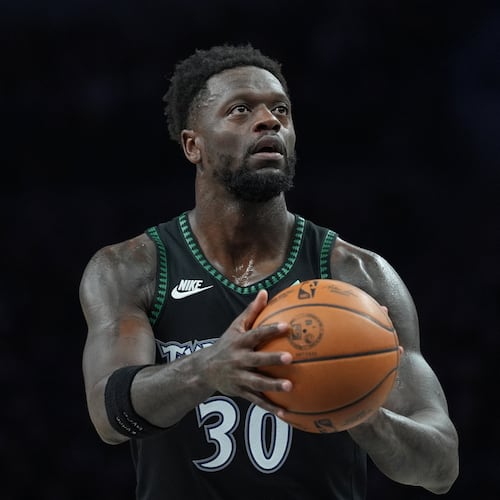 FILE - Minnesota Timberwolves forward Julius Randle shoots during the first half of Game 3 of a NBA basketball second-round playoff series against the San Antonio Spurs, May 8, 2026, in Minneapolis. (AP Photo/Abbie Parr, File)