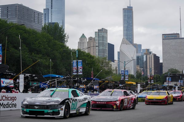 Drivers race in a NASCAR Cup Series auto race at the Grant Park 220, Sunday, July 6, 2025, in Chicago. (AP Photo/Erin Hooley)