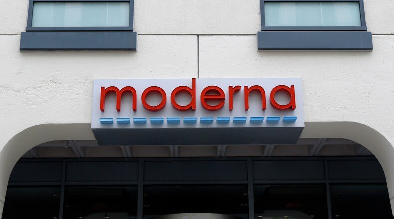 FILE - A sign marks an entrance to a Moderna building in Cambridge, Mass., May 18, 2020. (AP Photo/Bill Sikes, File)prnto