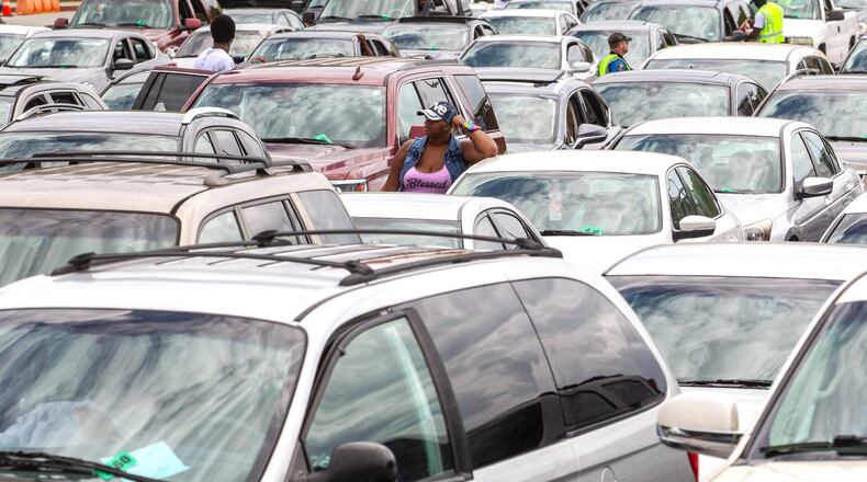 People wait in line to receive their COVID vaccinations at the Mall at Stonecrest on Saturday, August 28, 2021. One DeKalb resident said she ended up waiting more than six hours for her first dose. STEVE SCHAEFER FOR THE ATLANTA JOURNAL-CONSTITUTION