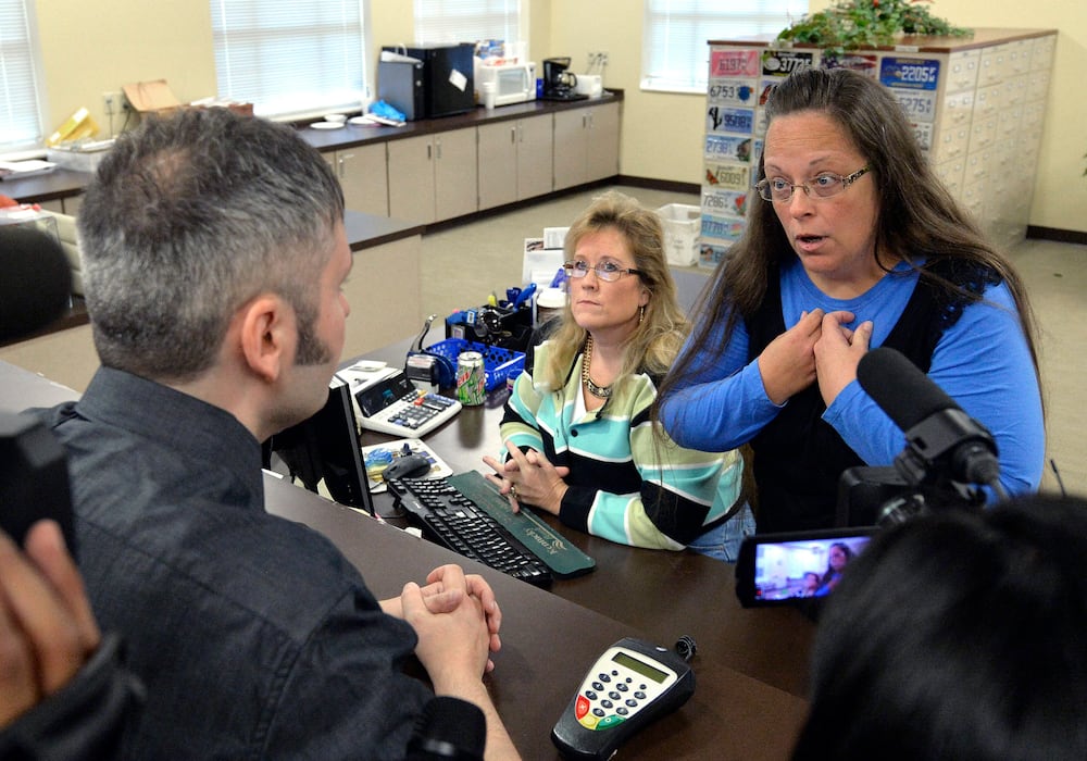 In this 2015 file photo, Rowan County Clerk Kim Davis (right) discussed her office's refusal to issue marriage licenses.