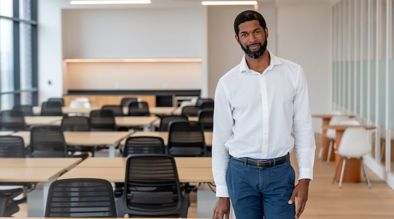 SVP Community and Assistant Manager Errol Williams poses for a photograph in one of the office spaces at the new Wework building in Atlanta Friday, Nov. 11, 2022. (Steve Schaefer/steve.schaefer@ajc.com)