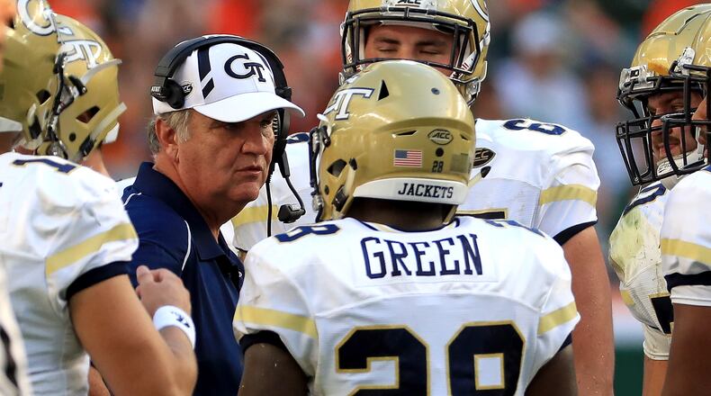 MIAMI GARDENS, FL - OCTOBER 14: Head coach Paul Johnson of the Georgia Tech Yellow Jackets talks to J.J. Green #28 during a game against the Miami Hurricanes at Sun Life Stadium on October 14, 2017 in Miami Gardens, Florida. (Photo by Mike Ehrmann/Getty Images)