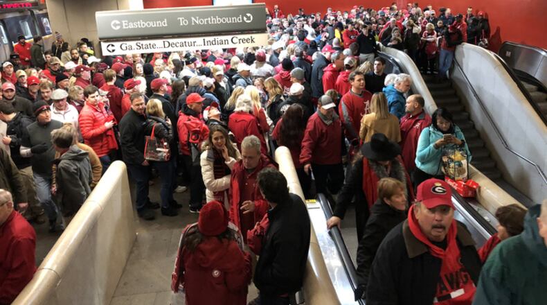 Mechanical problems caused delays and crowd control problems at MARTA's Five Points Station after Monday night's college football national championship.