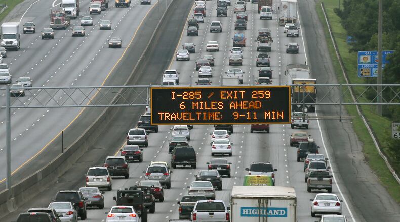 July 23, 2013 - Cobb County - Southbound traffic on I75 as seen from Allgood Road, south of the I575 merge. Morning commute traffic on I75 in Cobb County. State transportation officials on Tuesday will select the leading contractor to design and build the largest transportation project in state history, 30 miles of optional toll lanes on I-75/I-575 in Cobb and Cherokee counties that are estimated to cost up to a billion dollars. BOB ANDRES / BANDRES@AJC.COM