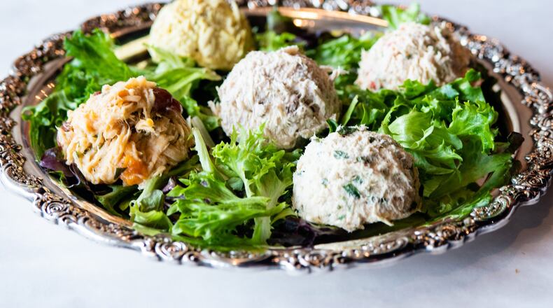 Chicken salad varieties at Cafe Lapin include (clockwise from top left) curry and almond, jalapeno, tarragon, apricot and walnut (middle). CONTRIBUTED BY HENRI HOLLIS