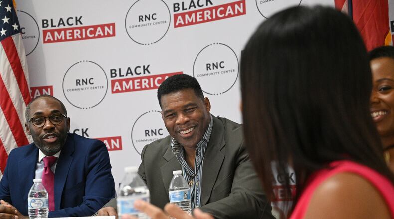 U.S. Senate candidate Herschel Walker reacts as he speaks during a Republican National Committee roundtable in College Park with Black business owners. Walker has been critical of state and federal programs that support minority-owned firms, although his own company, Renaissance Man Food Services, has benefited from them. (Hyosub Shin / Hyosub.Shin@ajc.com)