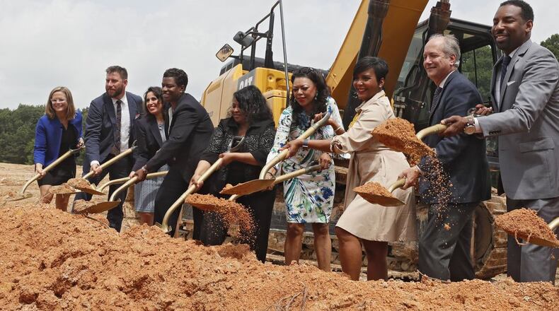 City officials at a groundbreaking ceremony for a housing development in Atlanta. AJC File