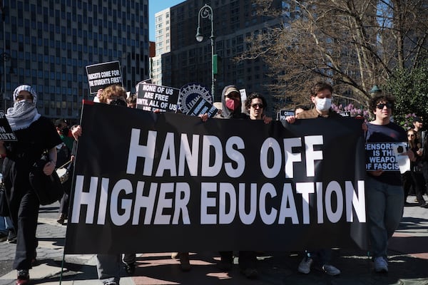 Students demonstrate against the Trump administration’s moves to force changes at colleges like Columbia and others by cutting grants and imposing various sanctions, at Foley Square in New York, April 17, 2025.  (Marco Postigo Storel/The New York Times)
                      