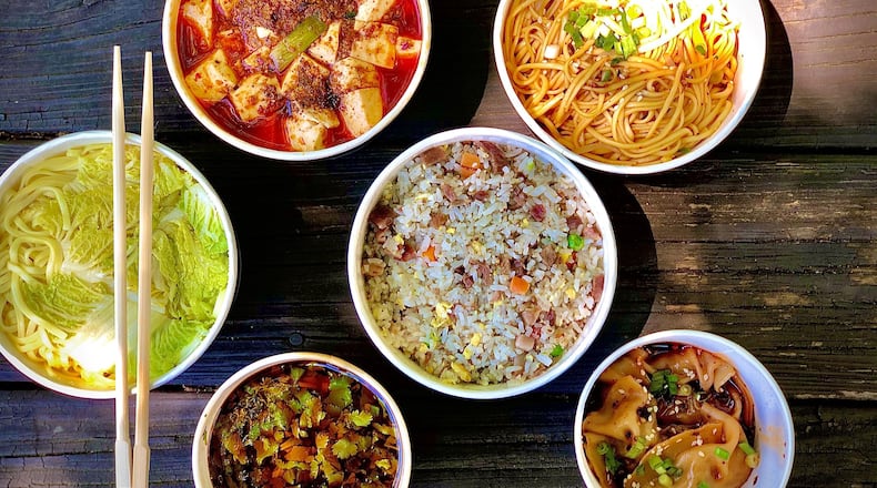 A selection of takeout dishes from G’s Kitchen in Chamblee. CONTRIBUTED BY WENDELL BROCK