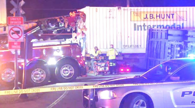 A tractor-trailer was split in half after it was struck by a train in Gwinnett County.