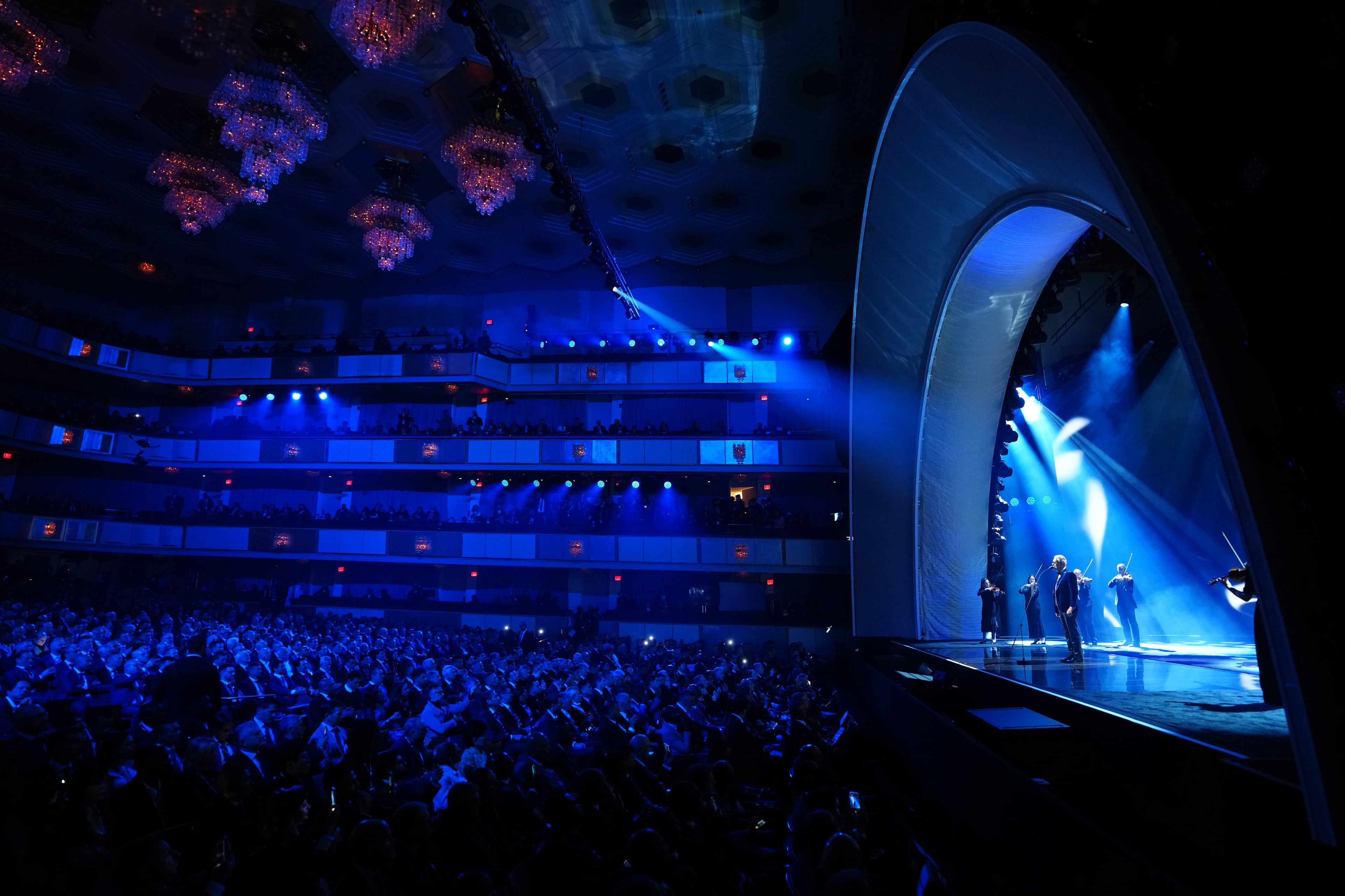 Singer Andrea Bocelli performs at the start of the draw for the 2026 soccer World Cup at the Kennedy Center in Washington, Friday, Dec. 5, 2025. (AP Photo/Jacquelyn Martin)