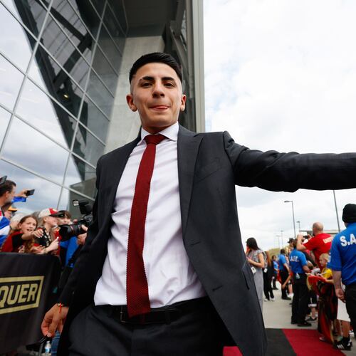 Atlanta United midfielder Thiago Almada greets fans upon the team’s arrival at Mercedes-Benz Stadium on Sunday, March 31, 2024, moments before the team faces the Chicago Fire. (Miguel Martinez/AJC)