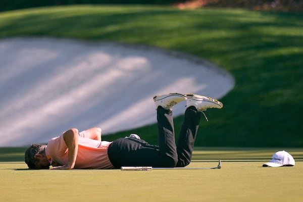 Justin Rose reacts after missing an eagle putt on the 13th hole during the final round at the Masters golf tournament, Sunday, April 13, 2025, in Augusta, Ga. (AP Photo/Julia Demaree Nikhinson)