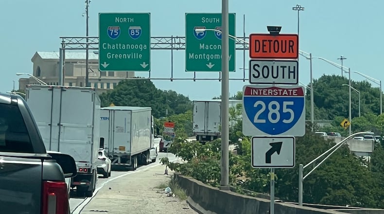 A detour sign directs I-20 eastbound traffic as motorists maneuver around an I-285 closure on Saturday, May 16, 2026. The GDOT is rebuilding the I-285 and I-20 interchanges on the east and west sides of Atlanta. (Cassidy Alexander/AJC)