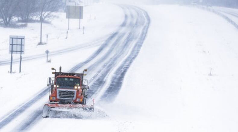 Heavy snows in Minnesota made driving hazardous.