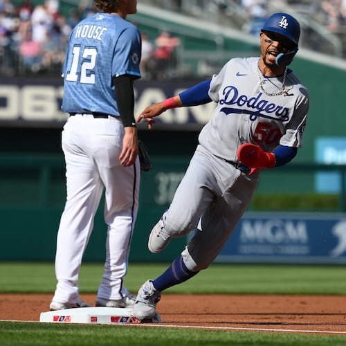 FILE - Los Angeles Dodgers' Mookie Betts in action during a baseball game against the Washington Nationals, April 4, 2026, in Washington. (AP Photo/Nick Wass, File)