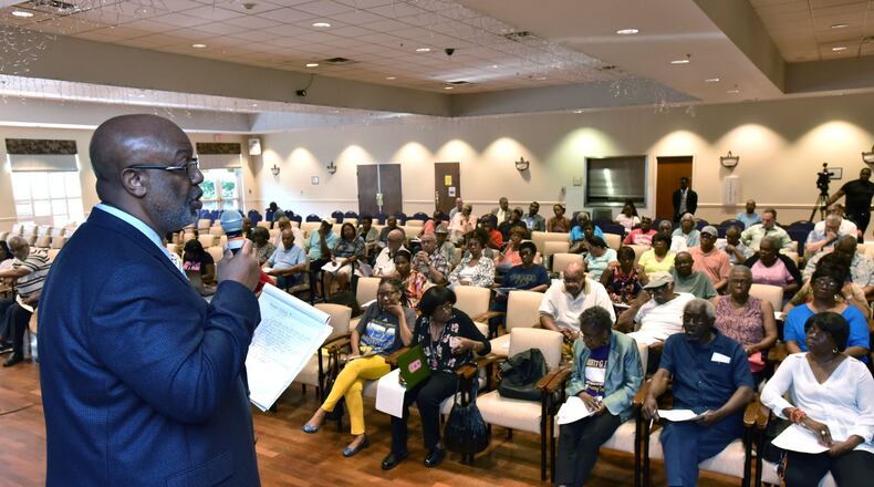 Dwight Robinson, chief appraiser, speaks before Fulton County residents during Emergency Town Hall Meeting to discuss Property Tax Assessments hosted by Fulton County Office of Chairman John Eaves at Harriett G. Darnell Senior Multipurpose Facility on Tuesday, June 13, 2017. Eaves and the other commissioners voted Wednesday to return the values to 2016 levels. HYOSUB SHIN / HSHIN@AJC.COM