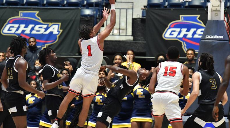 March 10, 2022 Macon - Tri-Cities' Noricco Danner (1) shoots over Eagle's Landing's AJ Barnes (5) during the 2022 GHSA State Basketball Class AAAAA Boys Championship game at the Macon Centreplex in Macon on Thursday, March 10, 2022. (Hyosub Shin / Hyosub.Shin@ajc.com)
