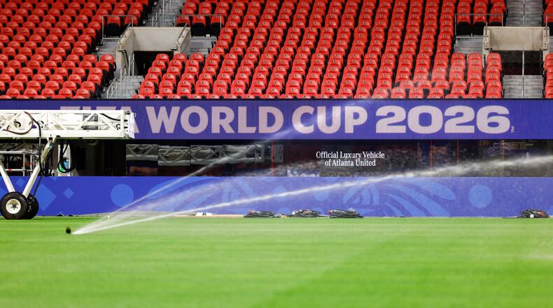 Newly installed grass for the FIFA World Cup is Kentucky bluegrass mixed with perennial ryegrass and artificial fibers stitched in. It came from a farm in Colorado. (Arvin Temkar/AJC)