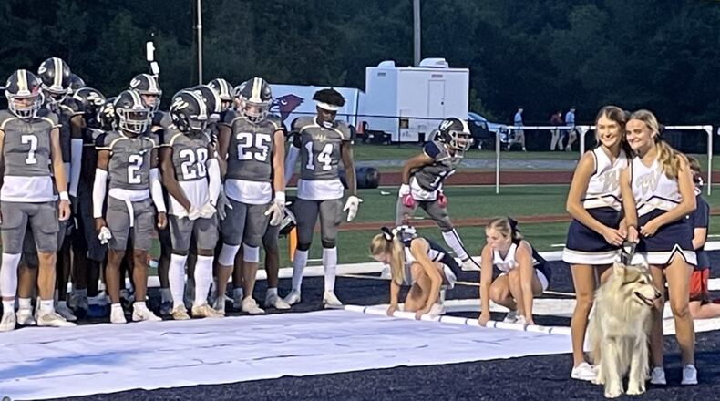 Whitefield Academy players prepare to take the field for their homecoming game Friday, Oct. 1, 2001, against Heritage of Newnan. (Photo by Chip Saye)