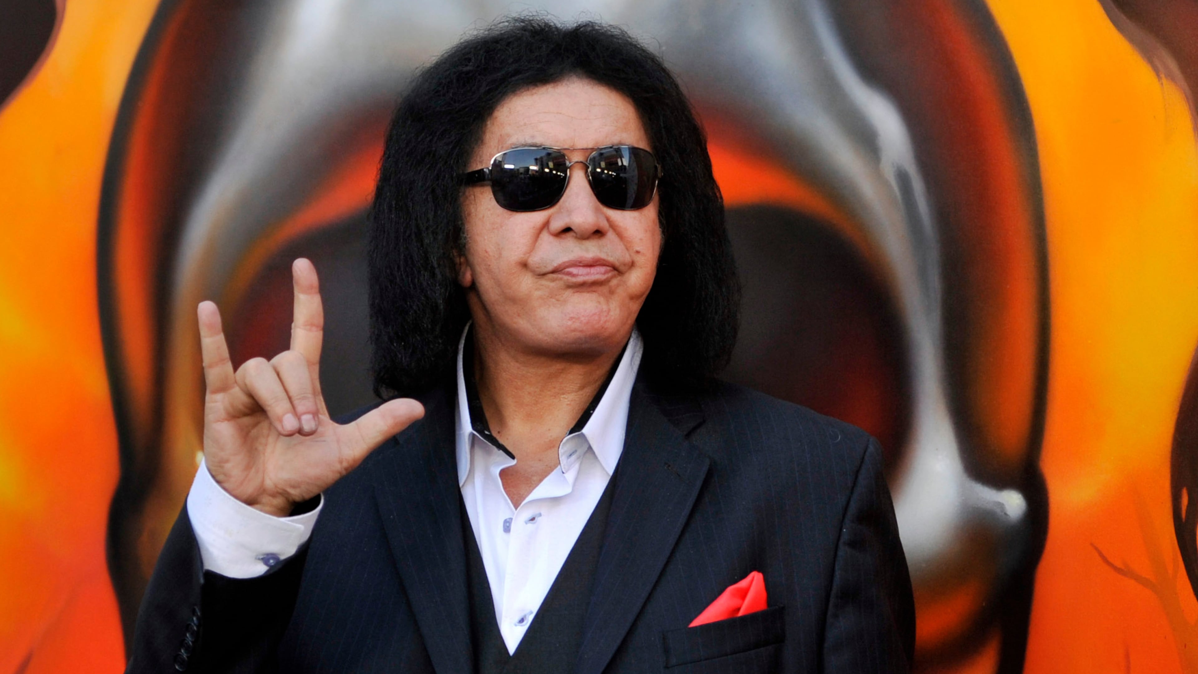 FILE - Gene Simmons of Kiss poses before the 2013 Revolver Golden Gods Award Show at Club Nokia on May 2, 2013 in Los Angeles. (Photo by Chris Pizzello/Invision/AP, file)