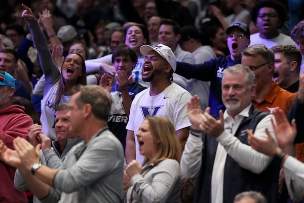 Xavier fans react during the second half of a First Four college basketball game against Texas in the NCAA Tournament, Wednesday, March 19, 2025, in Dayton, Ohio. (AP Photo/Jeff Dean)