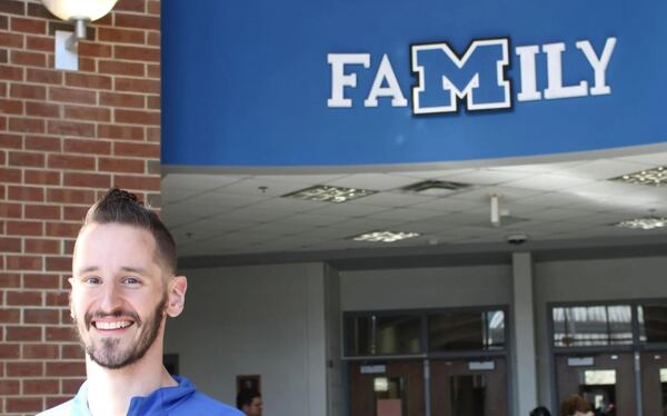 Model High teacher Robert Murdock models his new mohawk haircut in the Model High atrium Friday morning. Students and faculty raised over $3,000 to support three classmates who were diagnosed with cancer recently. (Photo Courtesy of Adam Carey/Rome News-Tribune)