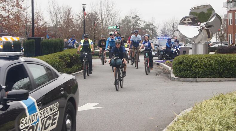 Officer Jansenn Redcay nears the end of his 1,000-mile ride for charity. (Photo Courtesy of Bob Pepalis)