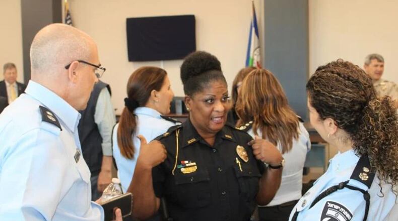 Rome Police Capt. Trixie Pollard-Morgan (center) speaks with members of the Israeli law enforcement delegation at the Law Enforcement Center. (Photo courtesy of Adam Carey)