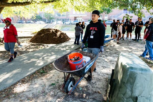 Falcons kicker Younghoe Koo helping out at the Hometown Huddle event at Anderson Park. 