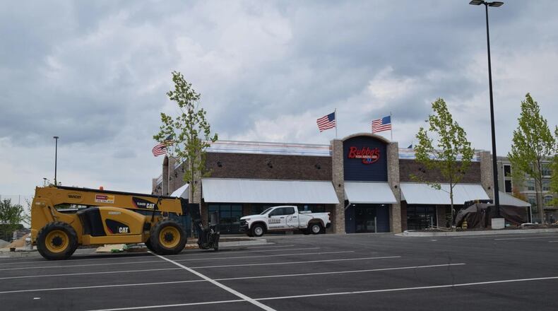 Bubba's 33 is getting closer to opening for business at the Exchange in Gwinnett in Buford. Crews are putting the finishing touches on the inside of the pizza and burgers restaurant. (Courtesy of Curt Yeomans)
