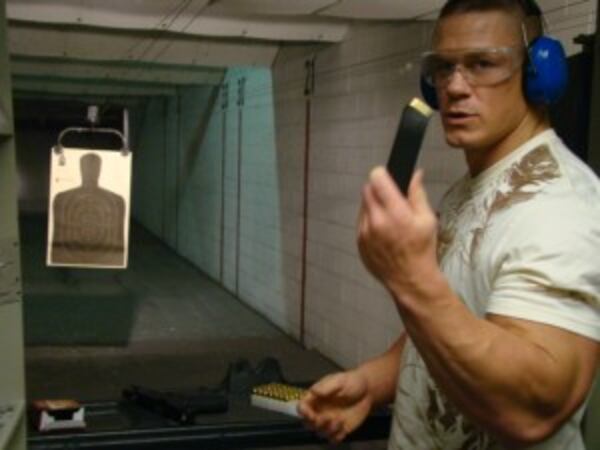 WWE wrestler and actor John Cena ready to shoot 12 rounds. CREDIT: Rodney Ho/rho@ajc.com