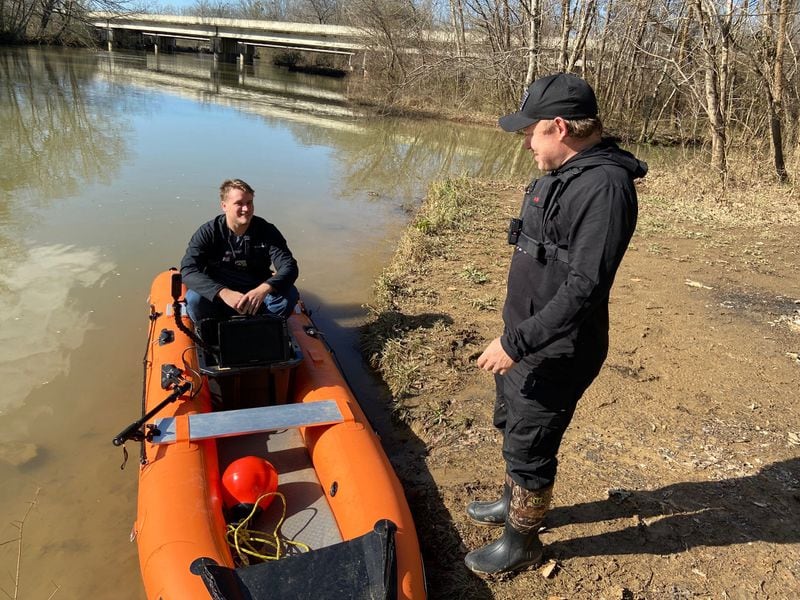 Jeremy Sides (right) traveled to Gadsden, Alabama, recently to try to solve a cold-case disappearance, meeting up with fellow diver Adam Brown. Photo: Bo Emerson